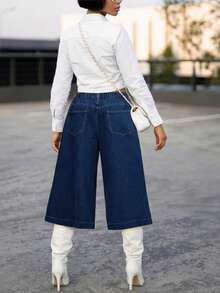 Quần jeans ống rộng cạp cao, dài đến 7/8, kiểu dáng công sở Pháp, chất liệu denim xanh đậm với thiết kế xếp ly, phù hợp cho nữ giới mặc đi làm hàng ngày và đi chơi thường ngày. - Màu xanh lam - Xem 4