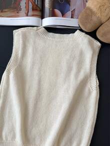 1 chiếc áo len dệt kim thanh lịch với họa tiết đan cáp cầu kỳ, thiết kế ren khoét rỗng, kiểu dáng thời trang không tay cổ tròn. - Màu be - Xem 7