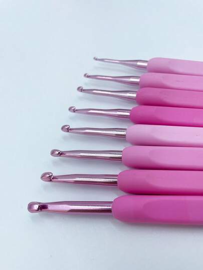 Bộ 8 kim móc màu hồng cán mềm, kích thước từ 2.5-6.0mm, tay cầm thoải mái, thích hợp để đan len, làm búp bê, làm quà tặng DIY, dành cho người yêu thích thủ công và sinh viên.