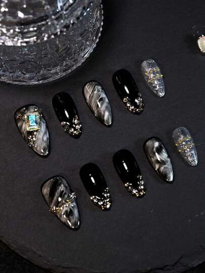 10片装美甲贴纸，杏仁形渐变黑色手工美甲贴纸，法式水钻Y2K甜美性感风格，适合日常佩戴、派对、新年、情人节等场合。此美甲套装包含1瓶甲油胶、1个迷你指甲锉和一套手工美甲贴纸。