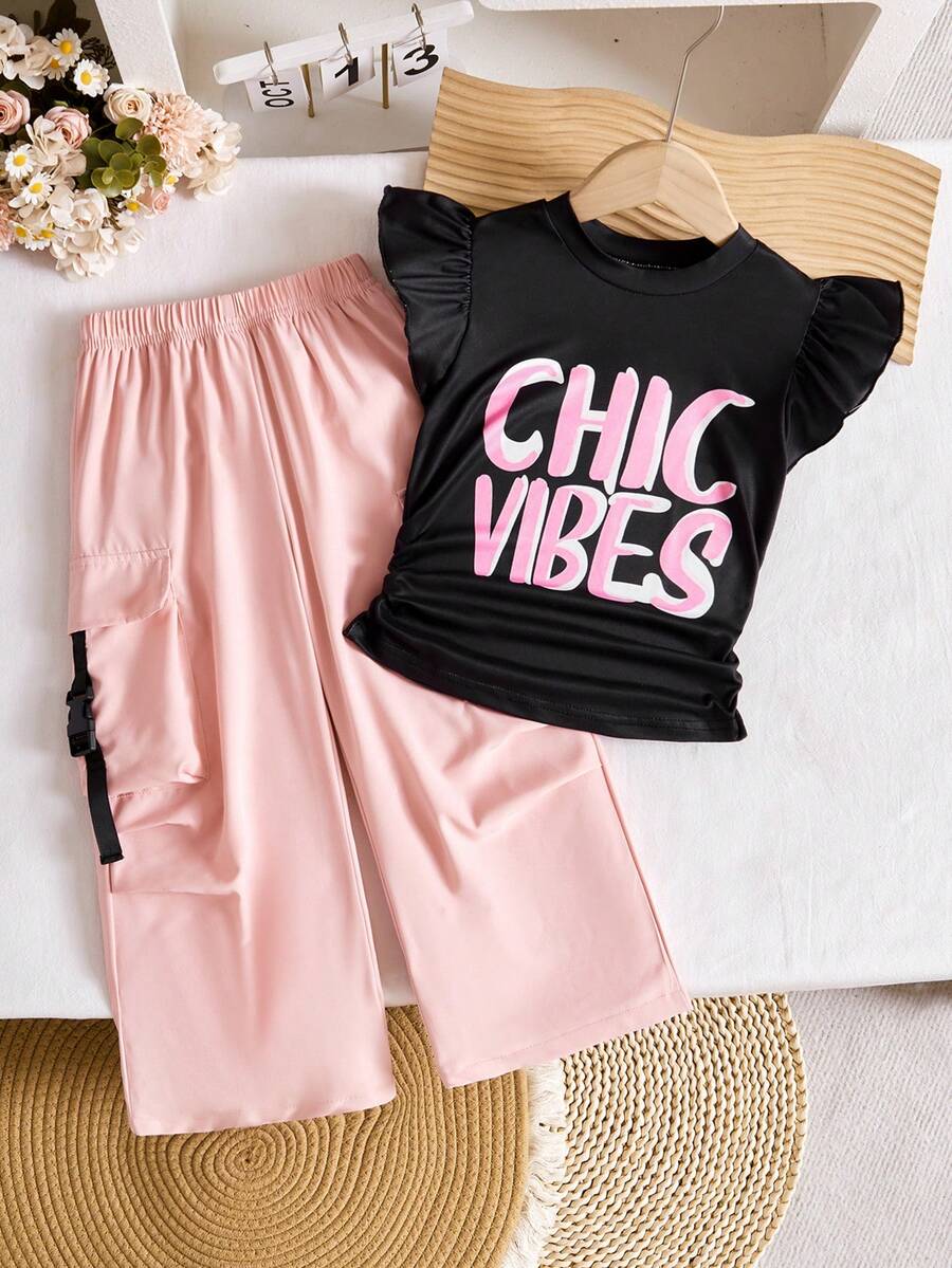 Girls' Chic Vibes Graphic Tee + Contrast Color Cargo Pants Set. The Outfit Features A Cropped Tee With "CHIC VIBES" Print And Puff Sleeves, Paired With High-Waisted, Relaxed-Fit Cargo Pants With Multiple Pockets And Contrast Trim, Perfect For Daily Wear, Dance Classes, And Hangouts With Friends. - Black - View 1