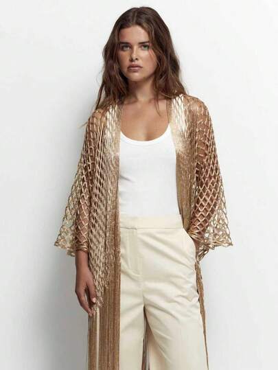 1件优雅新款金银丝线披肩，适合海滩、派对、晚礼服、正式场合、婚礼等，可作流苏围巾或服装配饰。