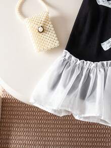 1 chiếc đầm công chúa dáng chữ A không tay, có nơ và bèo nhún cho bé gái - màu đen - Xem 6