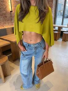 Áo kiểu poncho dệt kim rộng rãi dành cho nữ, mẫu mới Xuân/Hè 2026, màu vàng chanh, chất liệu dệt kim mềm mại, thoải mái, dáng rộng. Phong cách thường ngày năng động, nhẹ nhàng, cổ điển, thời trang đường phố, phong cách streetwear Mỹ, phù hợp cho các buổi biểu diễn nhạc sống, lễ hội âm nhạc, tiệc thời trang, mua sắm đường phố, triển lãm nghệ thuật, tụ họp bạn bè, tiệc tùng, đi chơi hàng ngày và nhiều dịp khác. - màu xanh lá - Xem 2