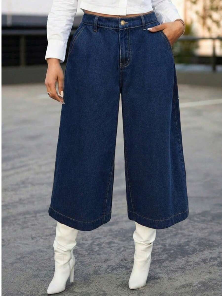 Quần jeans ống rộng cạp cao, dài đến 7/8, kiểu dáng công sở Pháp, chất liệu denim xanh đậm với thiết kế xếp ly, phù hợp cho nữ giới mặc đi làm hàng ngày và đi chơi thường ngày. - Màu xanh lam - Xem 1