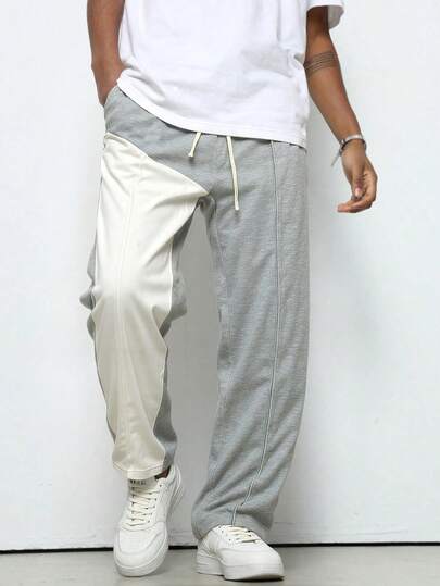 男士四季休闲运动直筒裤，抽绳腰带，侧边口袋，独特的撞色设计，更显时尚。适合日常休闲穿着、跑步、球类运动、健身房及其他运动场合。