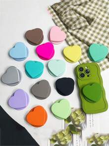 1pc Skin-Friendly Solid Color Heart-Shaped Magnetic Phone Holder, New Women's Adsorption Backpack, Desktop Stand Accessory, Super Attractive Strong Magnet, Compatible With Apple & Android Phones - Multicolor - View 1