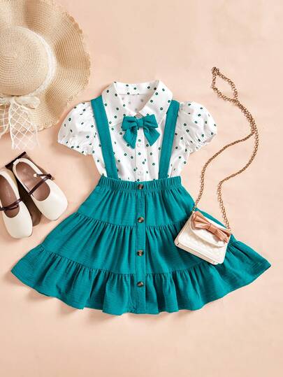 Girls' Preppy Style Moss Green Printed Outfit: Printed Shirt With Matching Bow, Layered Pleated Pinafore Dress With Vintage Buttons. Suitable As School Uniform Or Birthday Party Dress, Combining Retro British Style And Practical Daily Wear.
