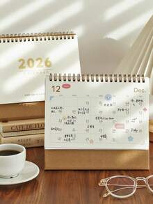 Lịch để bàn năm 2026 (Ngày: Tháng 11 năm 2025 - Tháng 12 năm 2026) là một cuốn lịch học tập và ghi nhớ văn phòng tối giản nhưng cao cấp. Nó cũng có thể được sử dụng như một lịch đếm ngược đến Giáng sinh. Bao gồm các tab hàng tháng, bố cục lịch trình và những câu trích dẫn truyền cảm hứng. Cơ chế lật một mặt giúp nó phù hợp với môi trường gia đình, văn phòng và tổ chức. - Lịch để bàn - Xem 3