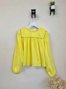 Hermiss Plain Blouse With A Round Neck Decorated With Studs On The Upper Part And Long Elasticated Sleeves. One Size Fits S/M. New Autumn/Winter Collection. Estimated Delivery 1-3 Business Days (Mainland Spain). - Yellow - View 2