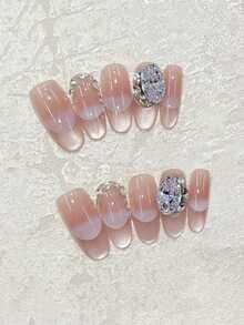 Peach On Your Nails! 10pcs Handmade Nails In Oval Shape. The Cat Eye Technique Features A Peach Pink Gradient Cat Eye Nail Art, Paired With Star-Shaped Zirconia Decorations. Gentle And Pure, Suitable For Everyday Outfits And Date Looks. Simple, High-End, Complexion-Enhancing, Cute, And Reusable Handmade Press-On Nail Set That Comes With Jelly Glue And One Mini Nail File. Handmade Press On Nails - Multicolor - View 3