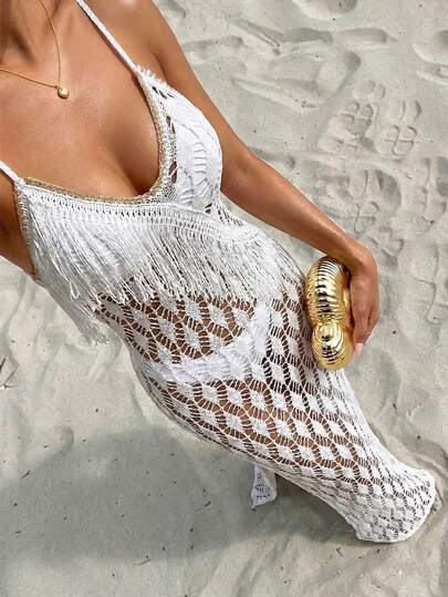 Vestido sin mangas de unicolor, sexy y transparente con diseño de flecos y calado para playa y vacaciones