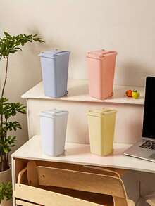 1个迷你桌面垃圾桶，带翻盖，防止异味扩散。可用于存放果皮、纸屑和其他桌面垃圾，保持桌面清洁。适用于浴室、家用书桌、咖啡桌、办公室、客厅和书房。 - 彩色 - 查看 7