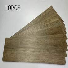 10片装，每片尺寸40x15厘米/15.75x5.91英寸，面积0.6平方米，可移除木纹地板贴纸，PVC材质，木纹自粘瓷砖贴纸，易于安装，防水防刮，适用于卧室、厨房、客厅、酒店等场所的家具和地板装饰。 - 10Pcs - 查看 17