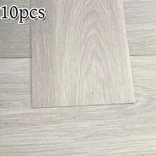 10片装，每片尺寸40x15厘米/15.75x5.91英寸，面积0.6平方米，可移除木纹地板贴纸，PVC材质，木纹自粘瓷砖贴纸，易于安装，防水防刮，适用于卧室、厨房、客厅、酒店等场所的家具和地板装饰。 - 10Pcs - 查看 16