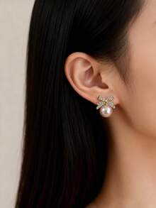 1 Đôi bông tai ngọc trai giả đính đá hình nơ sang trọng màu vàng cổ điển, thích hợp cho các cô gái tuổi teen, ngày Valentine và đeo hàng ngày. - Cung Ngọc Trai A - Xem 3