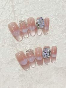 Peach On Your Nails! 10pcs Handmade Nails In Oval Shape. The Cat Eye Technique Features A Peach Pink Gradient Cat Eye Nail Art, Paired With Star-Shaped Zirconia Decorations. Gentle And Pure, Suitable For Everyday Outfits And Date Looks. Simple, High-End, Complexion-Enhancing, Cute, And Reusable Handmade Press-On Nail Set That Comes With Jelly Glue And One Mini Nail File. Handmade Press On Nails - Multicolor - View 12