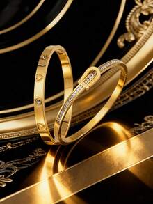 2/1pc Golden Jewelry Set, Sophisticated And Stainless Steel Bangle, Ideal For Intimate Dating, Upscale Party Occasions, Daily Business Commutes, And A Memorable Valentine's Day Gift, Designed With A Minimalist Yet Polished Appearance And Subtle Openwork Details That Add A Touch Of Refinement To Both Casual And Formal Ensembles, Ensuring You Look Effortlessly Stylish At All Times - Gold - View 1