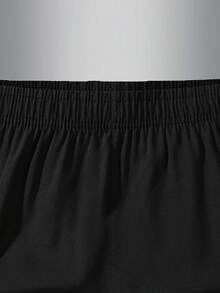 Conjunto de 4 pantalones cortos deportivos casuales de cintura elástica de unicolor para niños, apropiado para adolescentes - Negro - Ver 4