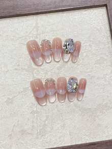Peach On Your Nails! 10pcs Handmade Nails In Oval Shape. The Cat Eye Technique Features A Peach Pink Gradient Cat Eye Nail Art, Paired With Star-Shaped Zirconia Decorations. Gentle And Pure, Suitable For Everyday Outfits And Date Looks. Simple, High-End, Complexion-Enhancing, Cute, And Reusable Handmade Press-On Nail Set That Comes With Jelly Glue And One Mini Nail File. Handmade Press On Nails - Multicolor - View 5