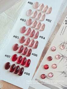 2026春夏新款女士节日礼盒套装，容量12毫升，包含闪耀玫瑰、裸粉色水晶猫眼、透明裸色、金色粉日记、酒红色乳玉猫眼、玻璃珠水晶猫眼六款凝胶指甲油。适合四季美甲，搭配底油和亮油使用，需配合UV灯固化。 - 彩色 - 查看 4