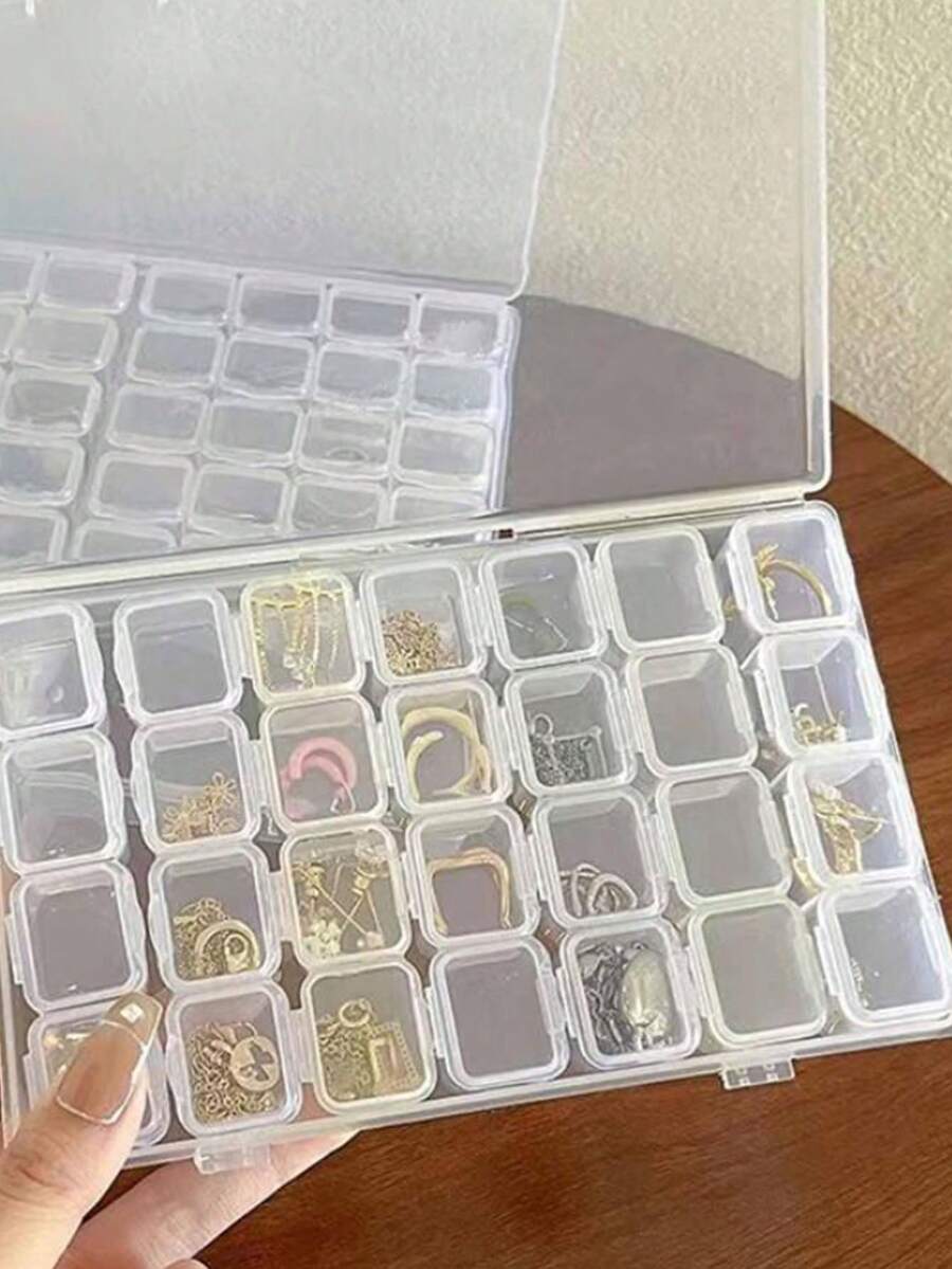 Caja organizadora de joyas de plástico transparente elegante con 28/56 compartimentos - Solución de almacenamiento a prueba de polvo para aretes & accesorios para mujeres - Multicolor - Ver 1