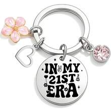 Llavero de cumpleaños - Llavero de acero inoxidable "En mi era de cumpleaños" con encantos de flor rosa, corazón y cristal, perfecto como recuerdo de fiesta de cumpleaños - Old Gold - Ver 13