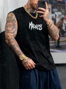 一件男士黑色圆领无袖背心，前后印有“MADNESS”字样，采用超柔软仿麂皮面料，美式街头风格，是夏季街头聚会的理想之选。 - 黑色 - 查看 4