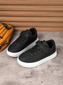 1双儿童黑白运动鞋，黑色皮革材质，魔术贴搭扣设计，软底减震，适合幼儿学步、上学、滑板等多种场合。 - 黑與白 - 查看 8