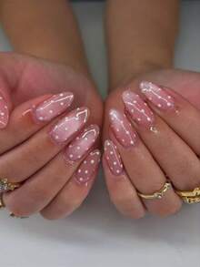 24片长杏仁形白色波点猫眼美甲贴纸，亚克力材质，适合短指甲。套装包含：1片果冻胶和1把指甲锉。波点和猫眼设计让您的指尖闪耀动人，是派对、舞蹈和日常使用的完美之选。美甲用品 - 淺粉色 - 查看 2