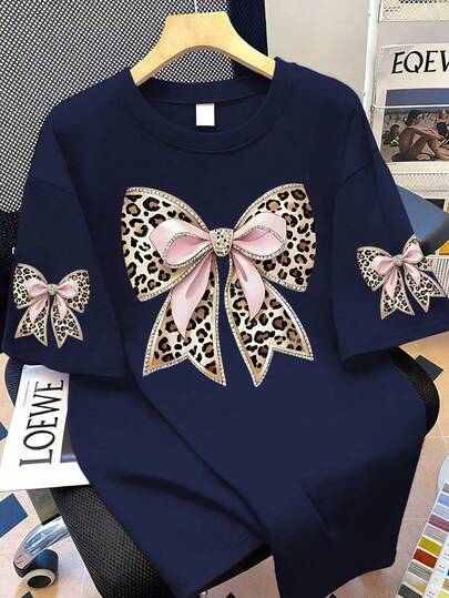 Plus Size Women Casual Leopard Print Bow Decor Round Neck T-Shirt. Suitable For Summer Vacation, Valentine's Day Gift, Mother's Day Gift, Mom Gift, Graduation Gift, Sleeve Print Fashion Short Sleeve. Suitable For Summer Holiday, Beach, Vacation, Spring, Carnival Outfit