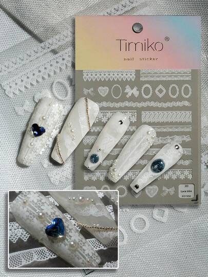 1张复古蕾丝主题美甲贴纸，饰有各种蕾丝条纹和镂空花卉图案，点缀着爱心、蝴蝶结和几何边框，精致优雅的复古设计，适合打造复古、甜美或奢华的美甲造型。