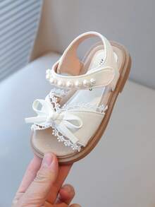 2025 Nuevos zapatos de princesa para niñas con suela blanda y antideslizante, de punta abierta, con cierre de gancho y bucle, en color beige - Beis - Ver 7