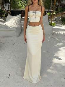 Bộ đồ hai mảnh màu vàng kem bằng satin acetate, áo corset gợi cảm phong cách Y2K và chân váy dài xòe cạp thấp, trang phục thời trang lãng mạn và thanh lịch cho kỳ nghỉ biển và phong cách đường phố mùa hè. - Vàng nhạt - Xem 3