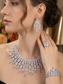 一套优雅奢华的立方氧化锆花束首饰套装，适合女士婚礼和宴会佩戴，包括1对耳环、1条项链、1条手链、1枚戒指（不含礼盒） - 紫色 - 查看 1