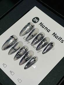 1package/10pcs-Y2K Dark Gothic Press On Nails | Smoky Gray Metallic Vibe + Butterfly/Lock/Moon Details - Stiletto Shape - Silver - View 1