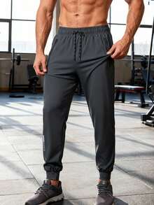 1 pieza Pantalón de chándal gris oscuro para hombres, transpirable, de secado rápido, ligero, con cordón en la cintura, adecuado para entrenamiento físico, lavable, versátil para uso diario y entrenamiento de verano - Gris Oscuro - Ver 4
