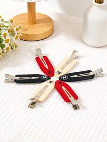 CHANEL Set de 6 pinzas para el cabello, pinzas de pato en rojo/blanco/negro, pinzas invisibles, pinzas para el flequillo, pinzas de garra, mini pinzas para el cabello, pinzas laterales, accesorios para el cabello - Pinza para el pelo roja, blanca y negra - Ver 1