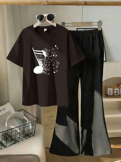 This Music Festival Casual Outfit Is Designed For Young Ladies, Featuring A Creative Musical Note Print Pattern. It Includes A Black Short Sleeve Round Neck T-Shirt And Flared Pants, Very Suitable For Summer Wear.