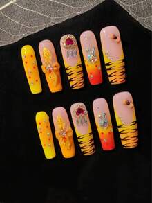 10片手工假指甲，按压式美甲，甜美又酷炫的虎纹款式，以粉色、橙色和黄色等暖色调为主，搭配经典的黑色虎纹图案。手工按压式美甲 - 彩色 - 查看 3