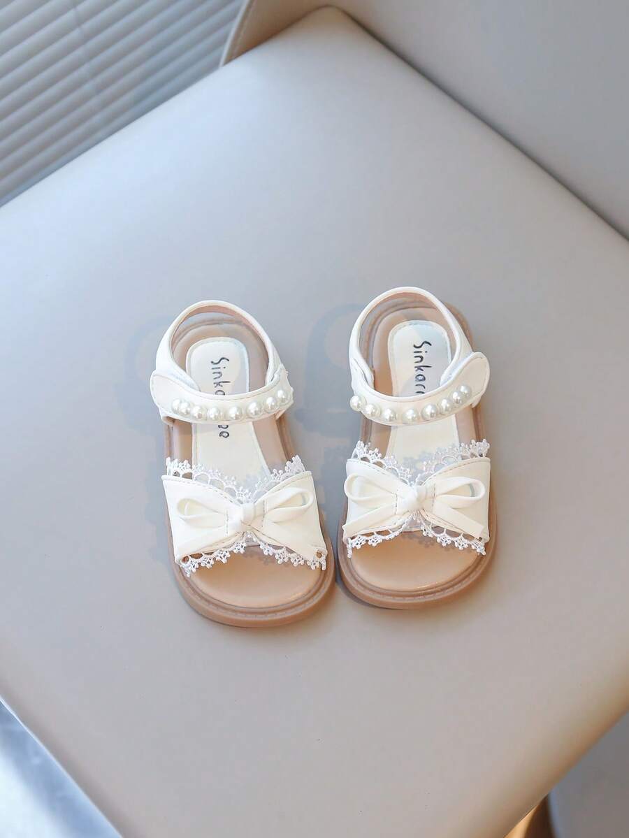 2025 Nuevos zapatos de princesa para niñas con suela blanda y antideslizante, de punta abierta, con cierre de gancho y bucle, en color beige
