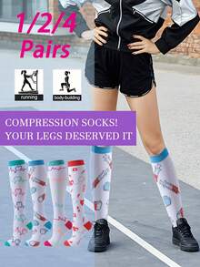男女通用压缩袜，1/2/4 双装，采用尼龙涤纶混纺针织面料，贴合腿部曲线，为瑜伽、马拉松、滑雪、网球、足球、健身、篮球等运动提供支撑，可机洗。 - 彩色 - 查看 8