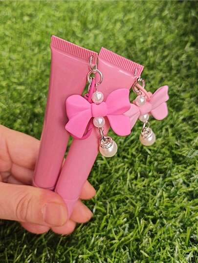 Stilvoller Lippenstift-Behälter mit schräger Öffnung, nachfüllbarer Kosmetikbehälter, Quetsch-Spender-Flasche, Lippgloss-Schlüsselanhänger, süßer Schlüsselanhänger für Frauen, Beauty-Werkzeug, Lippenstift-Taschenanhänger mit Stern- und Bär-Anhänger - eine Quetsch-Weichtuben mit Schraubverschluss für Lipgloss, Lippenbalsam, Geschenkverpackung, persönliche Beauty-Aufbewahrung, Valentinstag-Geschenk, Muttertags-Geschenk