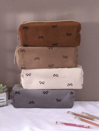 1pc Bow-Tie Pencil Case Is Adorable And Unique, Made Of Corduroy, And Has A Large Capacity. Lightweight And Portable, It's Perfect For Girls As A School Supply, Office Accessory, Or Everyday Item. Currently On Back-To-School , It's Also An Excellent Gift Choice For Valentine's Day, Teacher's Day, Chinese New Year, And Birthdays.