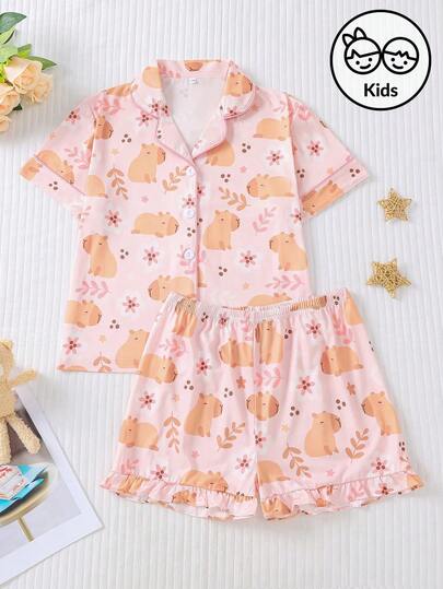 2pcs Kids Capybara Print Short Sleeve Pajama Set, Girls Cute Capybara Graphic Home Clothes Summer Lightweight, Flame Retardant New Turndown Collar Cardigan Children's Fashion Sleepwear Short Sleeve Shirt And Ruffle Hem Shorts, Children Middle & Large Size Daily Outfit, Can Be Worn Outerwear For Party, Machine Washable Pajama Set