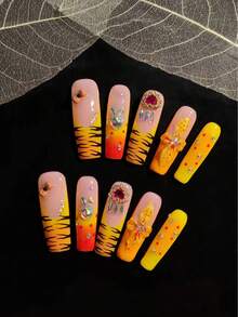 10片手工假指甲，按压式美甲，甜美又酷炫的虎纹款式，以粉色、橙色和黄色等暖色调为主，搭配经典的黑色虎纹图案。手工按压式美甲 - 彩色 - 查看 2