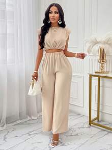 Bộ đồ 2 mảnh thanh lịch màu be của Eileen gồm áo crop top xếp ly không tay và quần ống loe cạp cao, phù hợp cho các bữa tiệc, lễ tốt nghiệp, trang phục thường ngày và những bộ đồ mùa hè sang trọng. - mai nhẹ - Xem 7