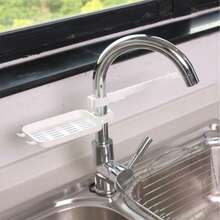 1个沥水架，棕色和白色可选，可放置海绵、抹布、钢丝球和其他小型厨房用具，可挂在水龙头上节省台面空间，是厨房必备的收纳整理工具。 - 彩色 - 查看 6