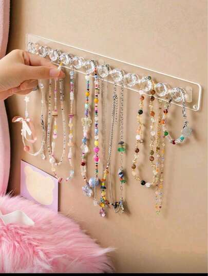 1个透明壁挂式首饰收纳架 - 多挂钩展示架，适用于项链、手链和耳环 - 非常适合梳妆台、镜柜和宿舍，是女性收纳整理、旅行度假必备、秋季装饰和万圣节装饰的理想之选