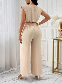 Bộ đồ 2 mảnh thanh lịch màu be của Eileen gồm áo crop top xếp ly không tay và quần ống loe cạp cao, phù hợp cho các bữa tiệc, lễ tốt nghiệp, trang phục thường ngày và những bộ đồ mùa hè sang trọng. - mai nhẹ - Xem 2